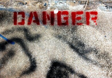 concrete ground with red danger text print